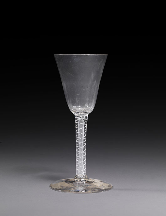 An English lead glass wine glass with opaque filigree air-twist, probably London, circa 1770, which can be seen at the Courtauld Gallery’s 'Illuminating Objects' exhibition until October 14. Image courtesy Courtauld Gallery, (Samuel Courtauld Trust: Wilfred Buckley Bequest, 1934).